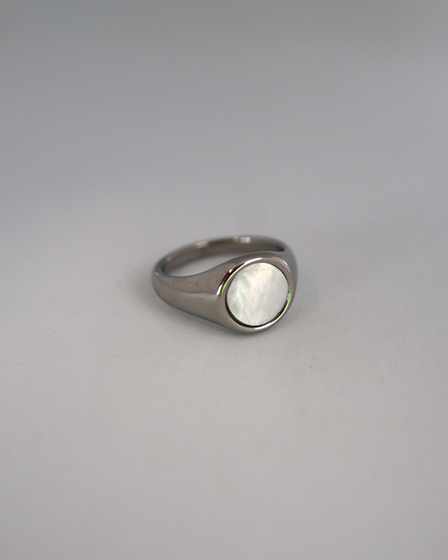 white circle shell ring