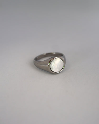 white circle shell ring