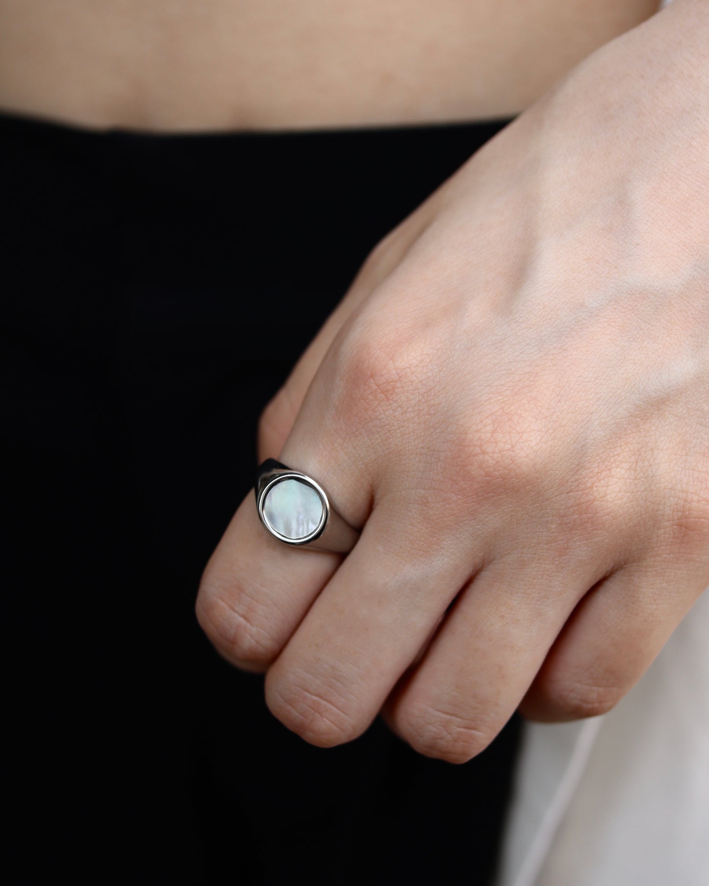 white circle shell ring
