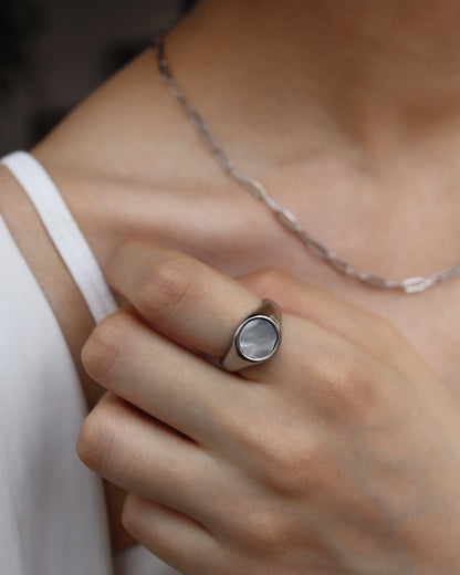 white circle shell ring