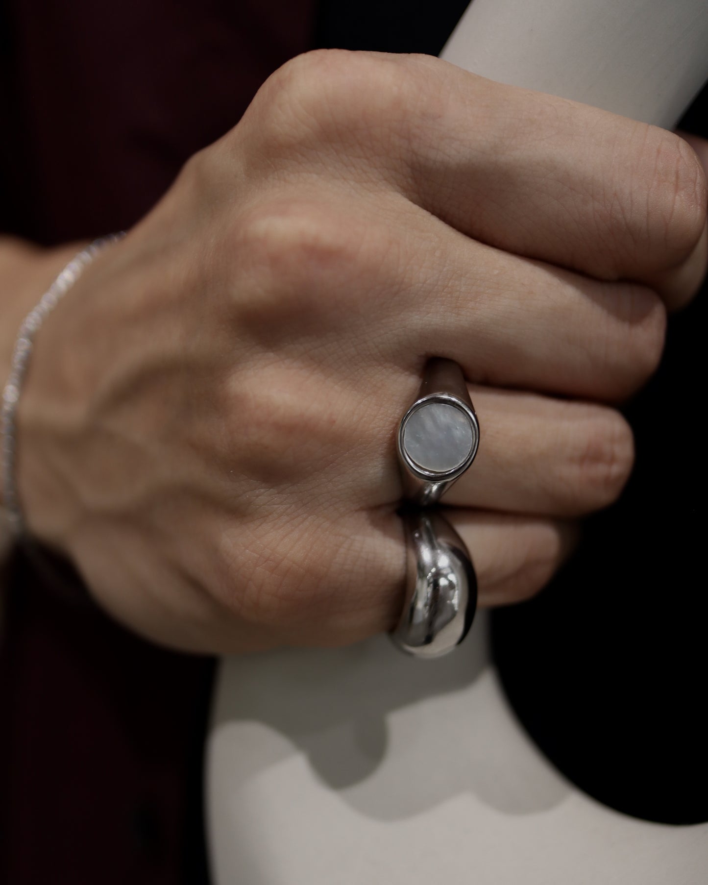 white circle shell ring
